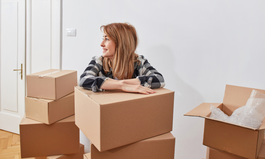Image 1 (stress-free moving day.png): "Woman leaning on a stack of moving boxes, looking to the side with a stress-free expression.