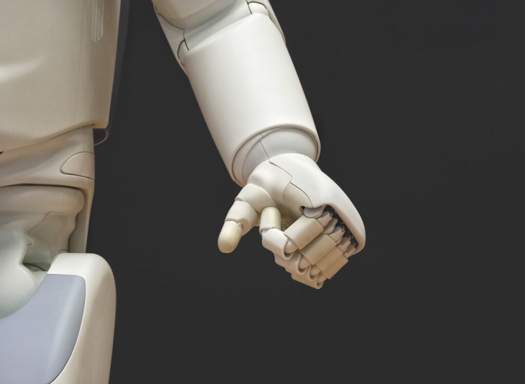 Professional's hand interacts with a glowing, futuristic digital screen, symbolizing the clarity and control AI brings to ...