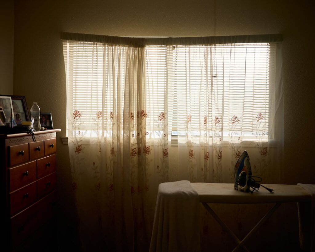 Close-up of modern kitchen blinds in a well-lit kitchen.